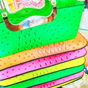 Dresses and shoes pants and purses plus size 14/18..shoes 8.5 / 8